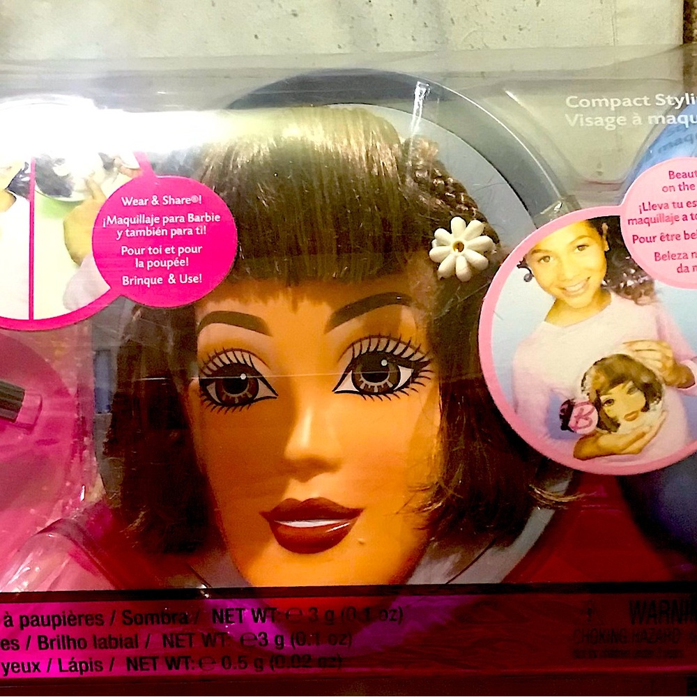 Barbie teaching little toddlers how to put make up on